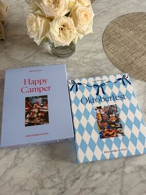 Two Pieceworks puzzles. No missing pieces.